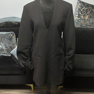 Elegant Black Women's Mini Dress with shoulder pads.